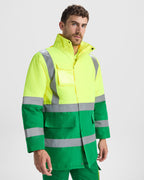 Roly Merak parka in green and fluorescent yellow, worn by a model.